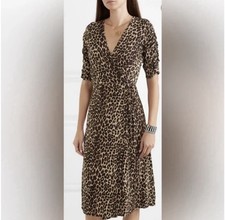 Faithfull The Brand Anne Marie wrap midi dress in a leopard print pattern