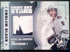 RYAN NUGENT-HOPKINS  AUTHENTIC PIECE OF AN EMBLEM FROM A GAME-USED JERSEY /6
