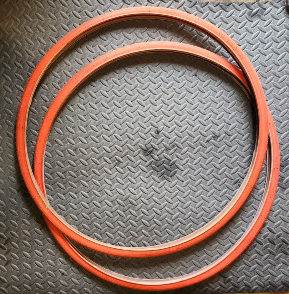 Two Orange 700 x 23 Zhengxing Bicycle Tires ISO 23-622