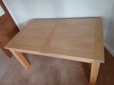 dining table without chairs. solid wood extendable