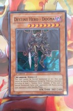 Yu-Gi-Oh Schicksalsheld Dogma 1. Auflage POTD-DE014 Nm