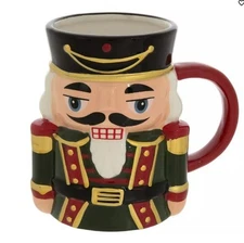 Sleigh Bell Bistro Nutcracker Mug 5 1/4"H 18oz Green/Red/Gold Accents