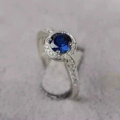 2Ct Round Cut Lab-Created Blue Sapphire Engagement Ring In 14K White Gold Plated
