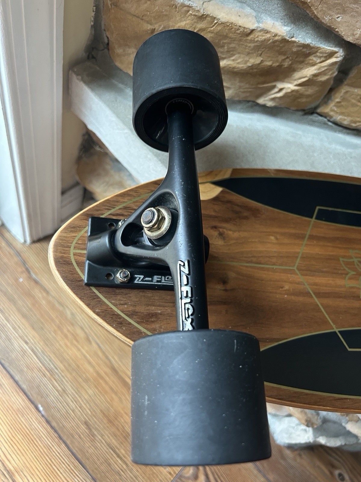 Z-Flex Ruins to Roses Roundtail longboard.