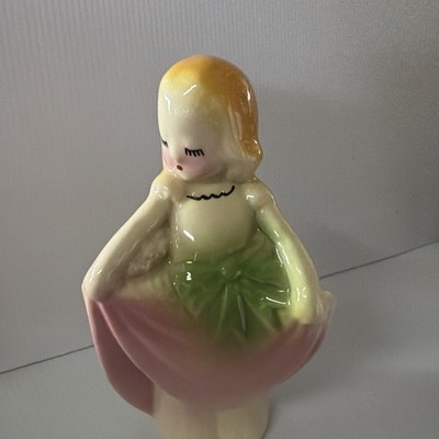 Vintage girl planter in skirt with bow