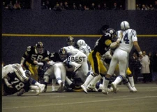 ANDY RUSSELL/JACK LAMBERT 12/27/75 AFC PLAYOFF VS COLTS JONES SACK COLOR 8X10