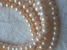 SOFT WHITE 6MMX5MM FRESH WATER PEARLS ONE 15 INCH STRAND 