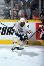Mike Grier Edmonton Oilers skates on the ice at an NHL game - Ice Hockey Photo
