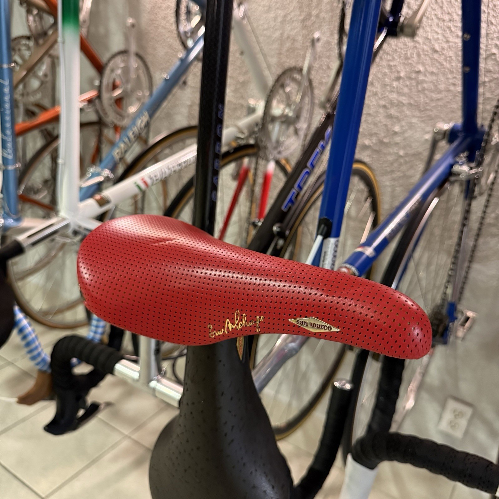 VINTAGE 1987 SELLE SAN MARCO ROLLS SADDLE RED LEATHER ERNESTO COLNAGO GRAPHICS