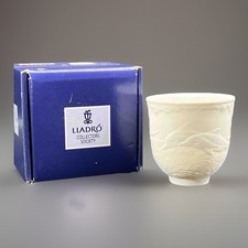 Lladró Porcelain Pair — 'Dolphins at Play' Votive Cup & Reclining Cherub Figurine — listing 4
