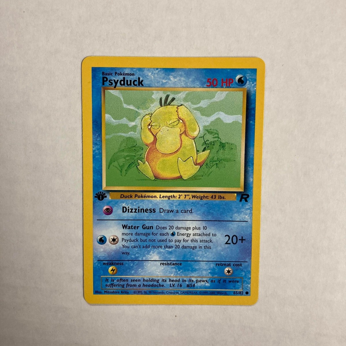 Pokémon TCG Psyduck 65/82 1st edition team rocket card | eBay
