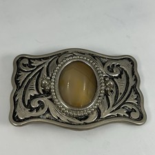 silver-tone western-style belt buckle with an oval stone centerpiece