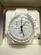 An image depicting OMEGA x Swatch MoonSwatch Moonphase SO33W700 42mm Quartz White Box Papers