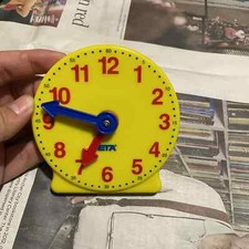 New Kids HAND2MIND Yellow Learning Geared Clock Size 4" Comes with 2 