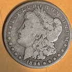 Item #1587 —1894-O Silver Dollar G