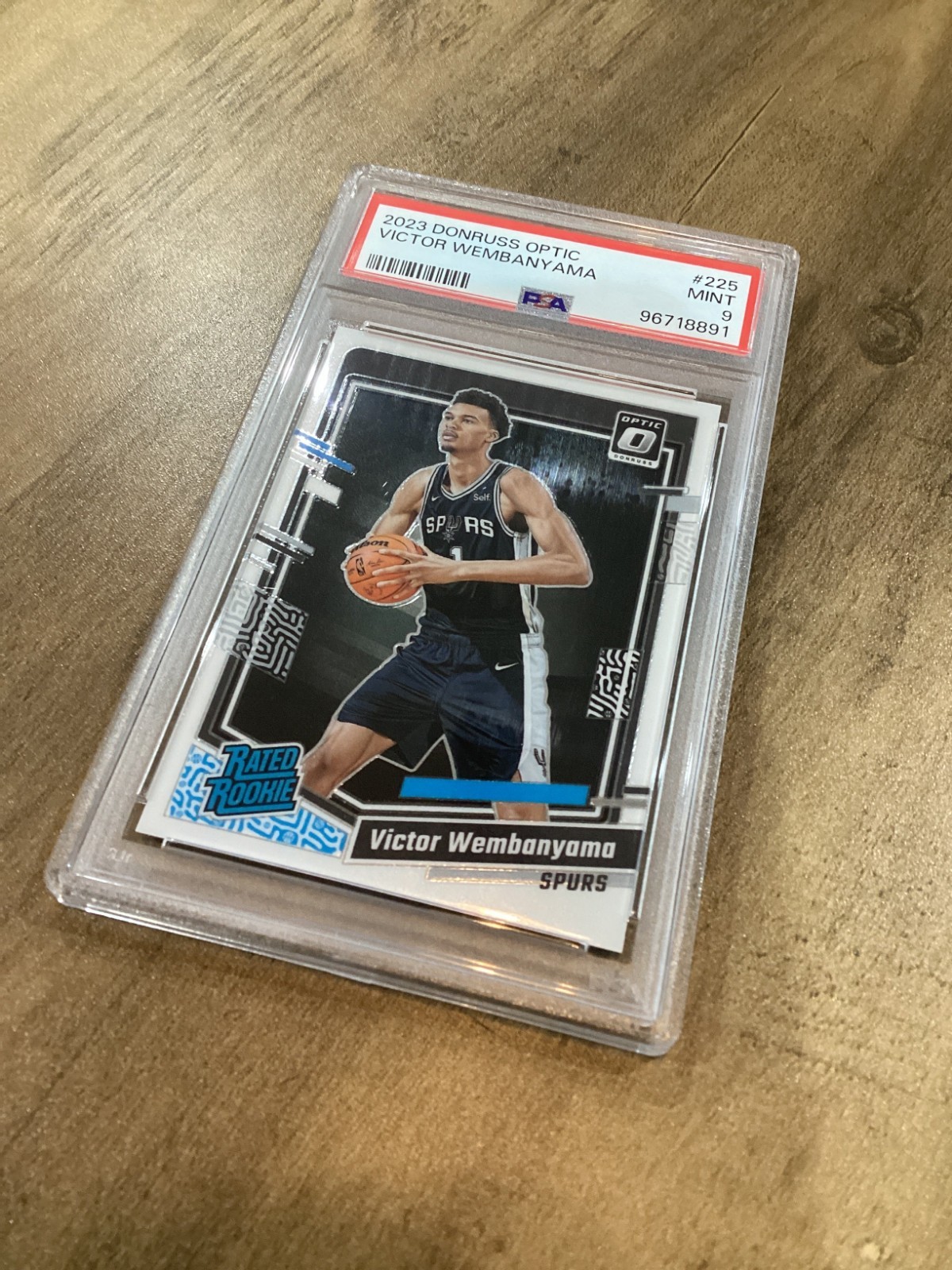 2023-24 Panini Donruss Optic Victor Wembanyama #225 RC PSA 9 trading card view 3