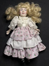 PORCELAIN DOLL COLLECTIBLE  8 1/2” Unknown