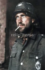 WW2 PICTURE PHOTO GERMAN SOLDIER SMOKES A CIGAR 6519