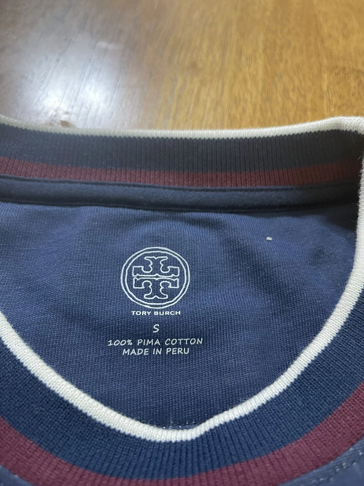 T shirt stampata TORY BURCH taglia S granato imperiale Wonderland vite nuova con scatola