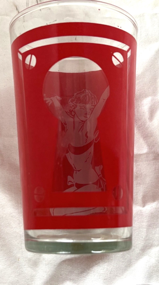 MCM peek-a-boo keyhole barware glasses with a cheeky burlesque pinup motif — the kind of retro naughty-but-playful barware that doesn't get made anymore.