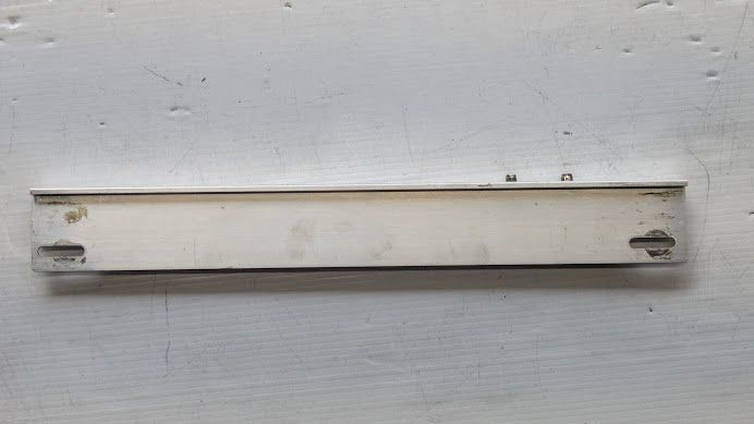 FERRARI 456M LEFT DOOR ROLL UP GLASS HORIZONTAL GUIDE 65778100