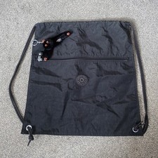 Zaino Kipling Supertaboo nero con coulisse borsa da nuoto con ciondolo scimmia Davina