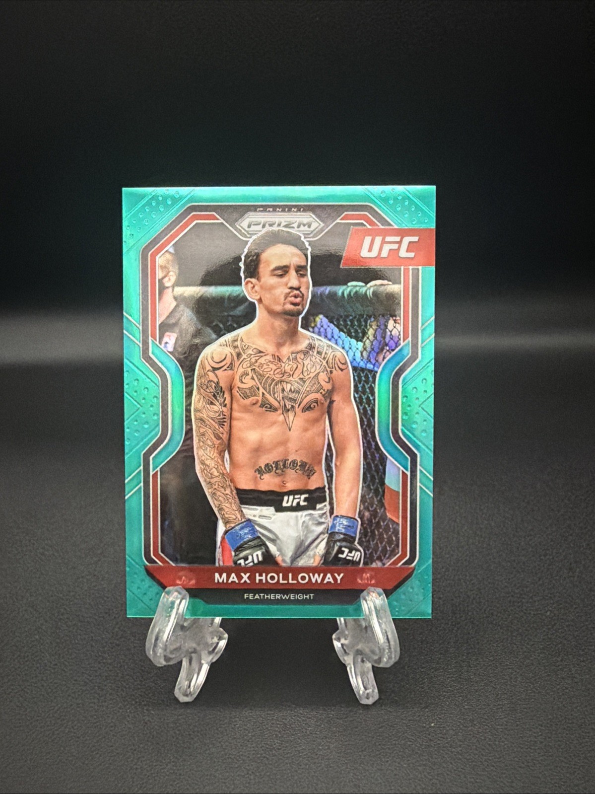 2021 Panini Prizm UFC Max Holloway Teal Prizm 19/49 – Short Print – NM