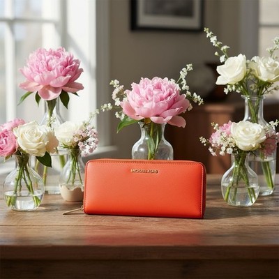 Michael Kors Jet Set Travel Large Saffiano Leather Quarter-Zip Wallet.