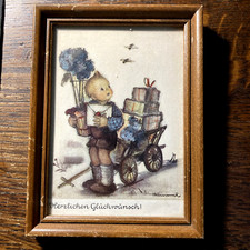 Hummel w ramce nadruk pod szkłem: chłopiec z prezentami i pszczołami