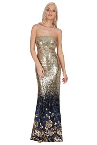 abito lungo paillettes oro