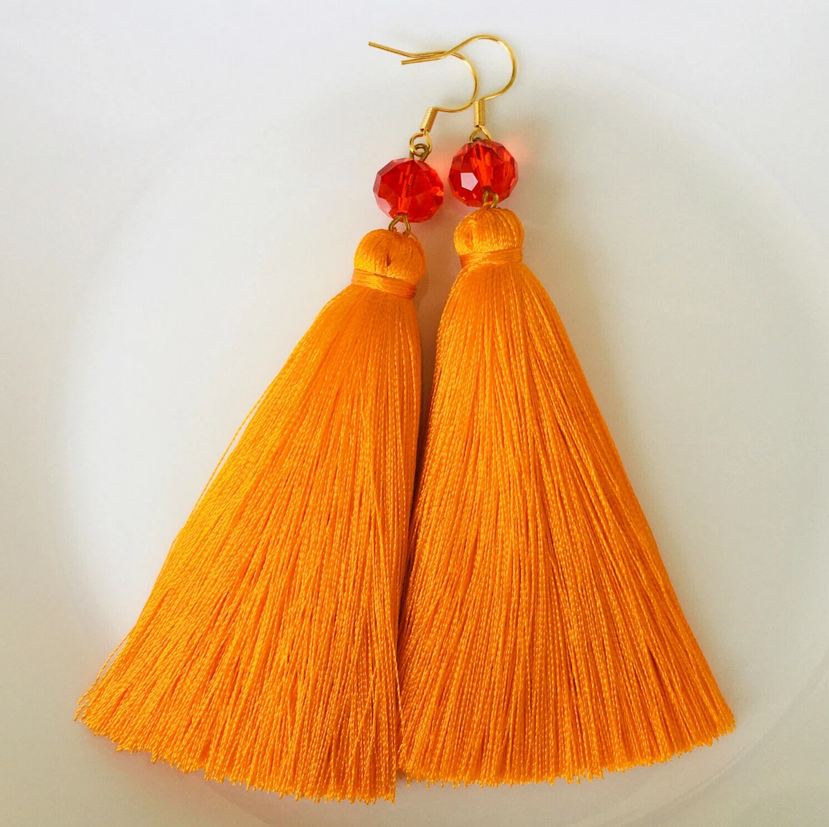 Orange fringe earrings outlet