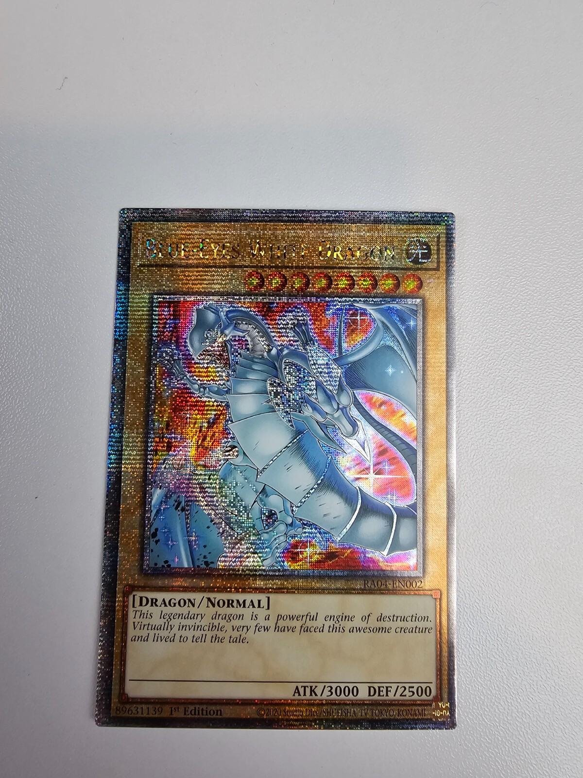 Blue-Eyes White Dragon (New Art) (Quarter Century Secret Rare) RA04-EN002...
