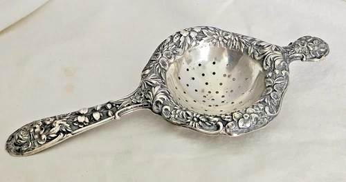 S.KIRK & SON FANCY REPOUSSE STERLING TEA STRAINER - 62.8 GRAMS