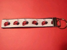 WONDERFUL LADYBUG LOGO FABRIC KEYCHAIN GREAT FOR ANY COLLECTION NEW