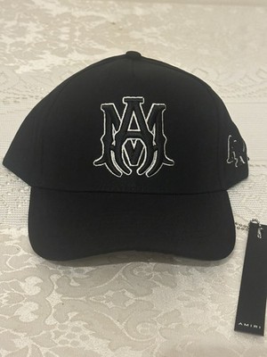 Amiri Core No Trucker Hat Black Spider logo Black and White