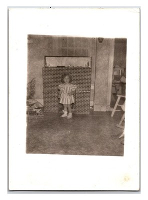 Vintage Original 1930s Girl Next To Fake Fire Place Snap Shot Photo (2.5 x 3.5)