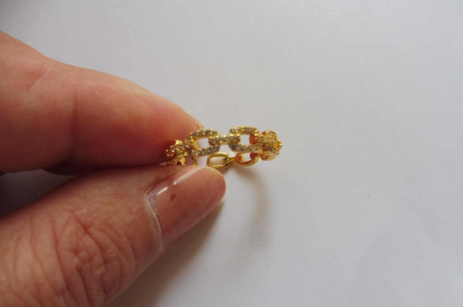 Bague ouverte Fabergé Art Déco en métal doré pour sublimer vos soirées