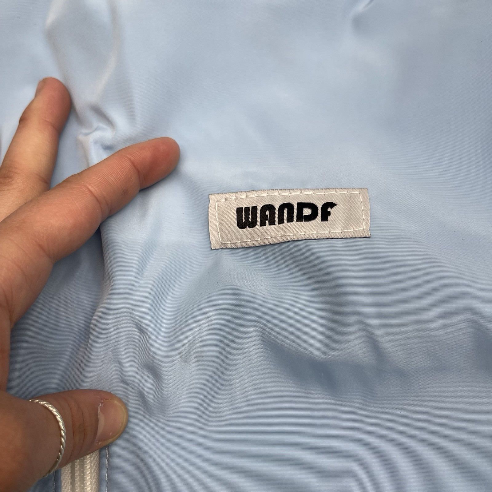 Wandf Light Blue Water Resistant Drawstring Polyester Backpack Bag Defect