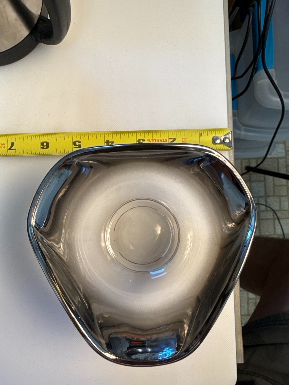 Smoked gray art glass bowl in a freeform triangle shape
