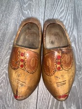vintage hand-carved Dutch wooden clogs featuring a hand-painted design