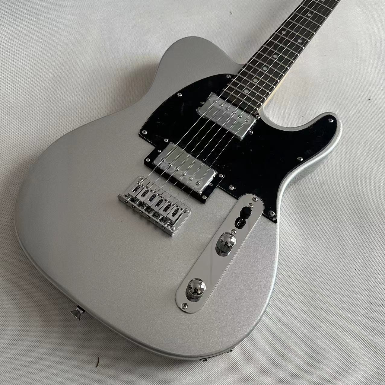 Silver powder white TL electric guitar, fixed bridge black protective plate, alternate view 2