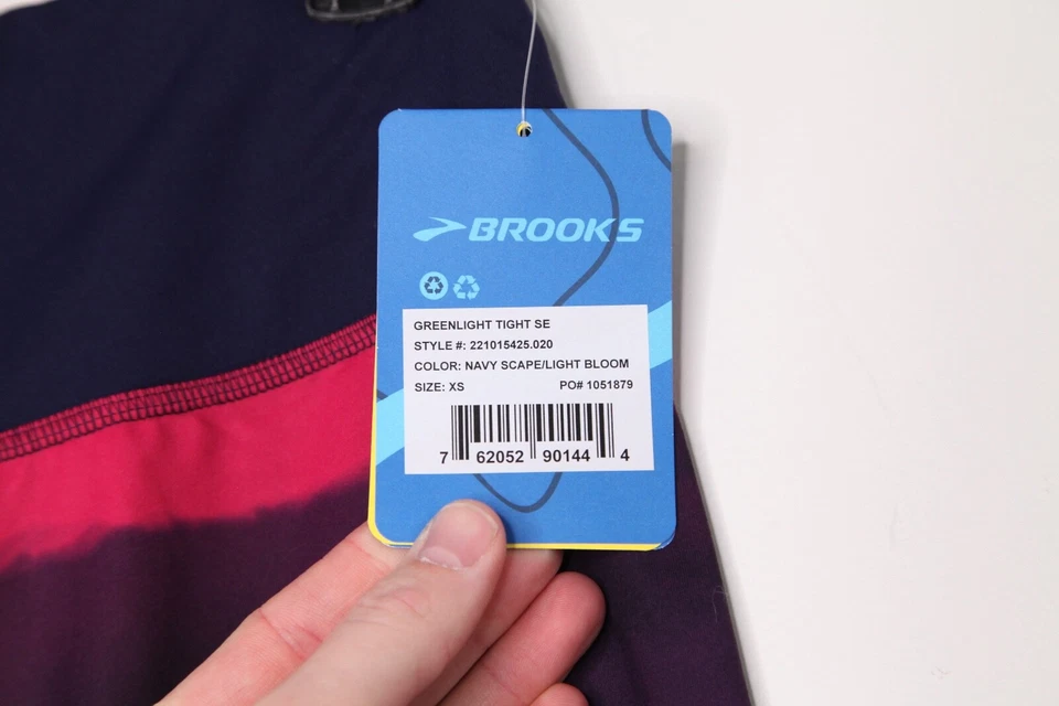  Pantalones de mujer Brooks reversibles Greenlight Tight SE NUEVOS CON ETIQUETAS azul marino paisaje/flor claro XS Foto 4 de 4