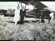 Vintage Photo Couple Next To Biplane Aircraft 1920’s