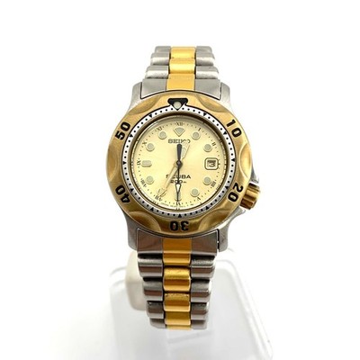 SEIKO 3E25-0A10 Quarzuhr Silber Gold Creme Zifferblatt 100m Wasserdicht