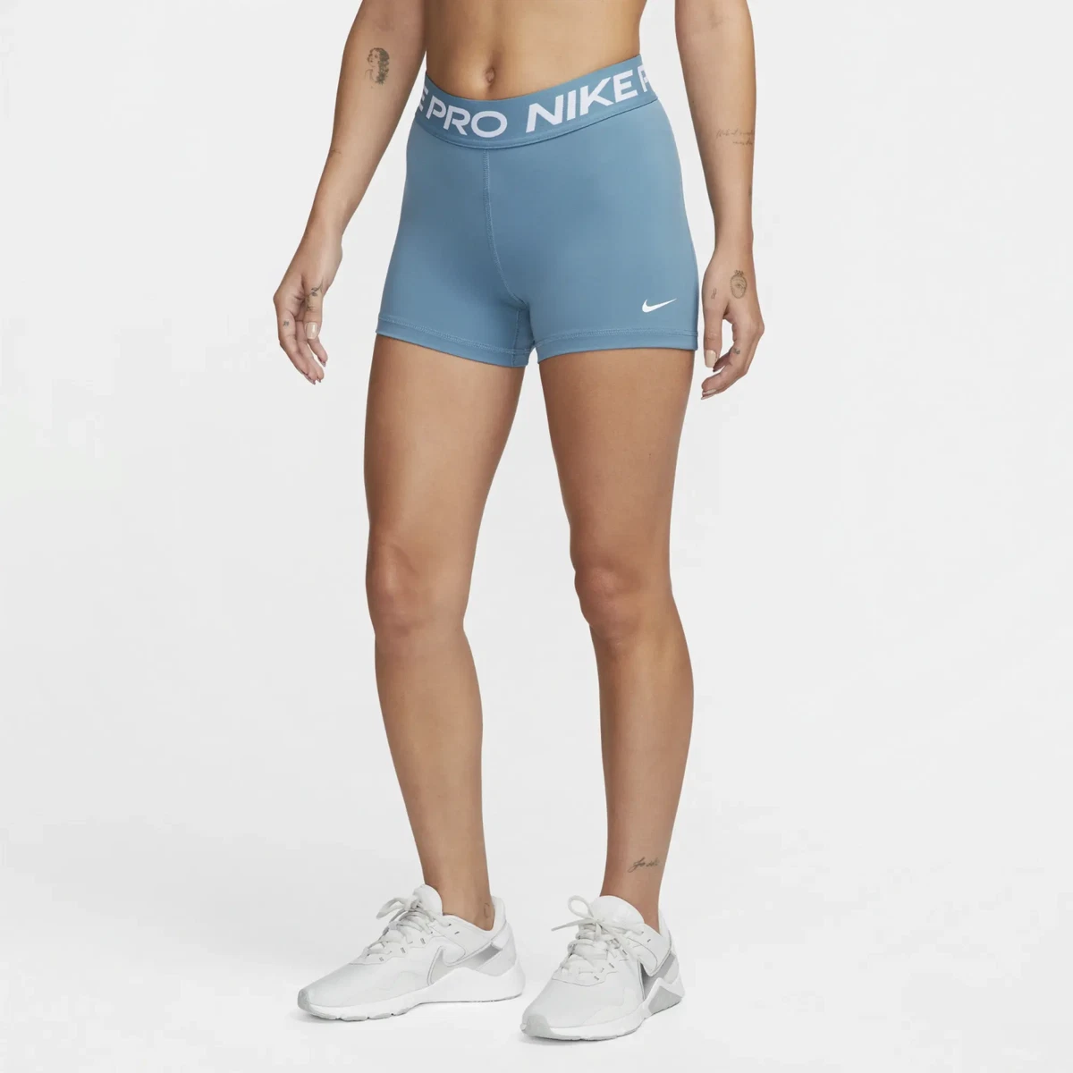 Nike Pro Women's Mid Rise Tight Fit 3” Training Shorts. Noise Aqua