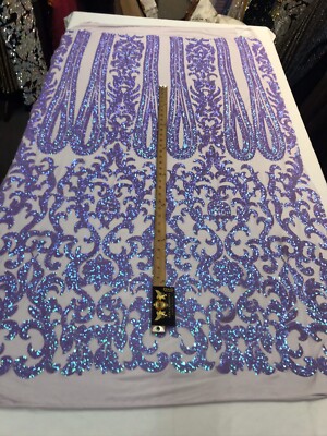LAVENDER IRIDESCENT CLASSIC SEQUIN DESIGN ON A 4 WAY STRETCH MESH-BY YARD.