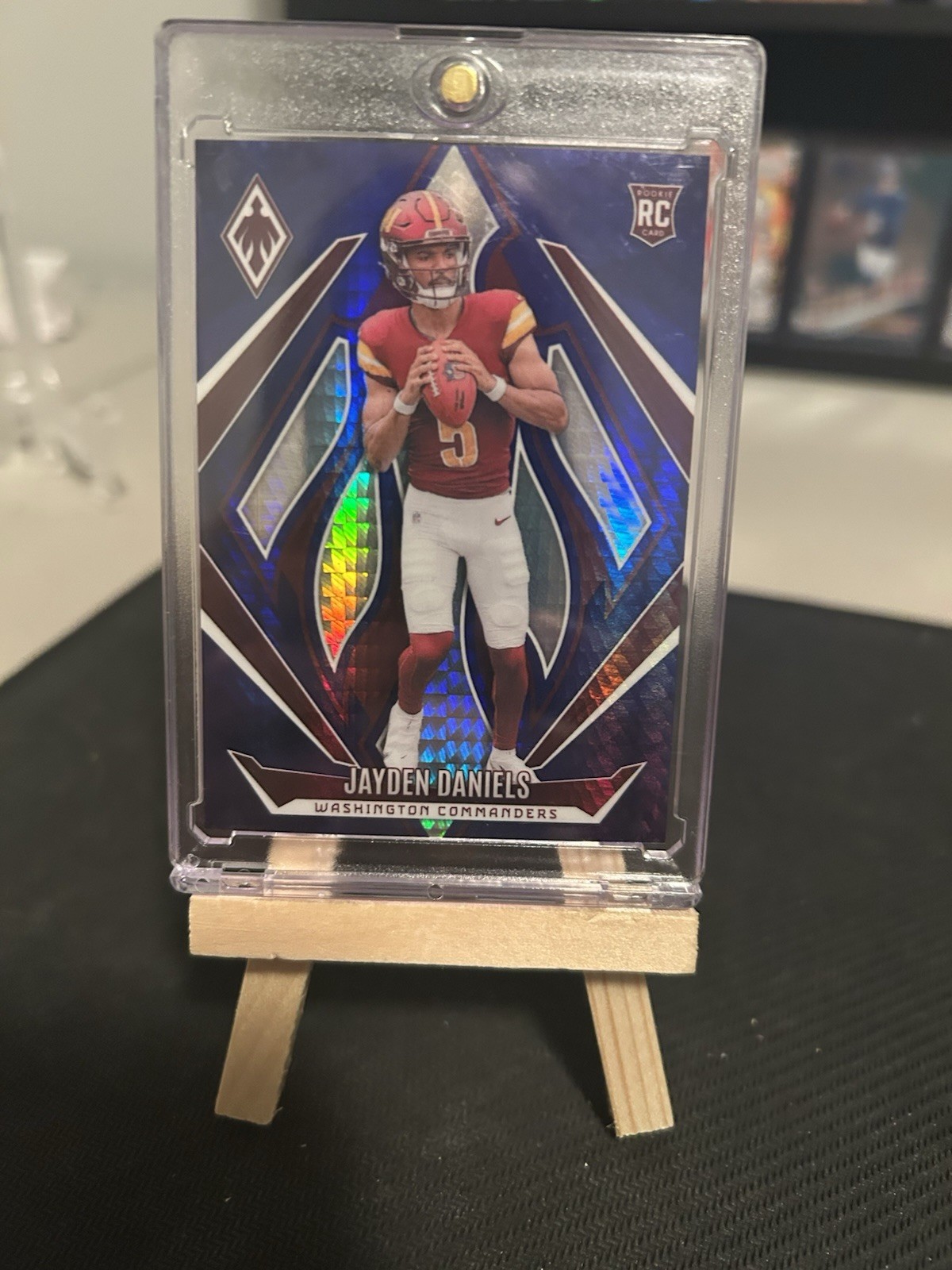 2024 Panini Phoenix - Rookies Jayden Daniels #198 Blue Hyper /70 (RC)