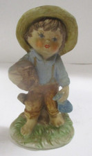 Vintage Ceramic Bisque Little Figurine of Boy in Overalls
