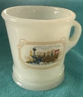 Vintage Avon milk glass shaving mug with a steam locomotive transfer