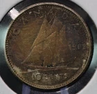 1962 circulated .800 silver Canadian 10 cents. with reverse toning.